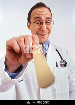 A doctors visit from a patient's personal perspective or view and doctor looking into patients mouth Stock Photo