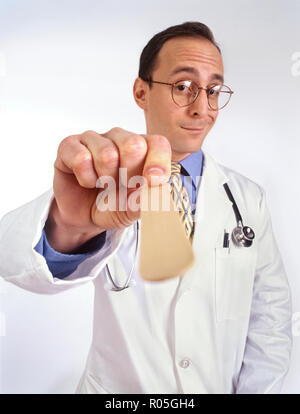 A doctors visit from a patient's personal perspective or view and doctor looking into patients mouth Stock Photo