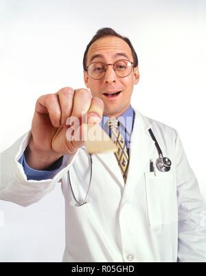 A doctors visit from a patient's personal perspective or view and doctor looking into patients mouth Stock Photo