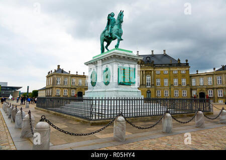 Equestrian statue of Amalienborg founder King Frederick V in Amalienborg Palace courtyard Copenhagen Denmark capital city Stock Photo