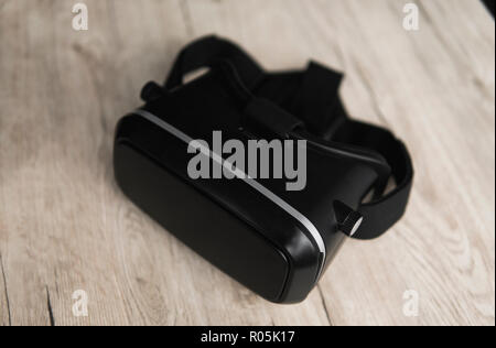 VR virtual reality glasses on a table. Stock Photo