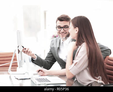 Two managers in a business meeting analyzing data Stock Photo
