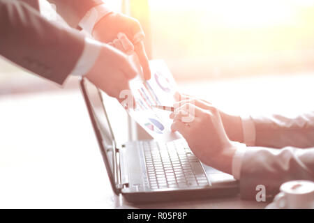 close up.colleagues are discussing financial data. development concept. Stock Photo