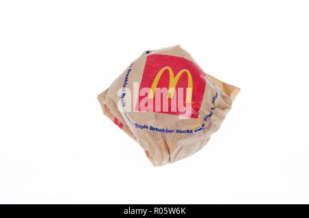 McDonald's Egg McMuffin in paper wrapper packaging on white background ...