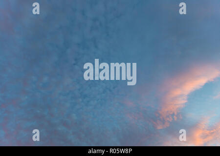 Dramatic colored sky. Moon and star in the clouds. Stock Photo