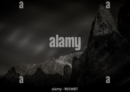 Awesome black and white effect on dolomite walls of Cima Undici and Cima Una at sunset, South Tyrol, Italy Stock Photo