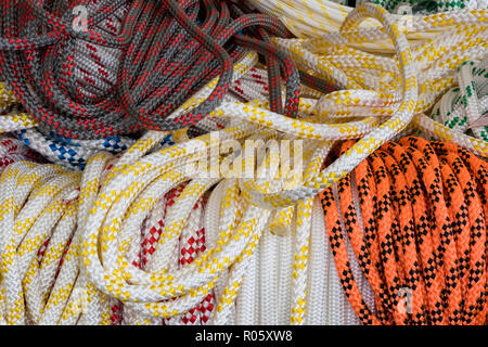 multi-coloured sailing ropes running through rope clutches. rope ...