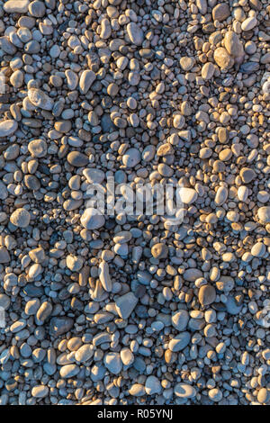 Background with white pebbles on the Albanian beach Stock Photo