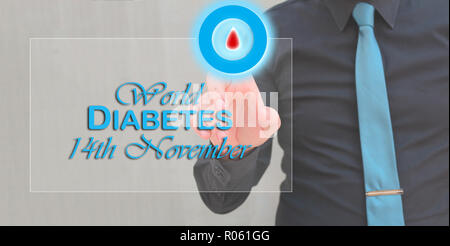 man hand pointing finger on blue circle with blood drop, diabetes awareness day concept Stock Photo