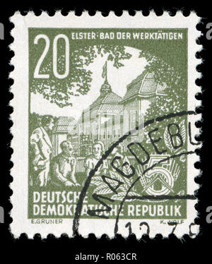 Postmarked stamp from the East Germany in the Five-year Plan series