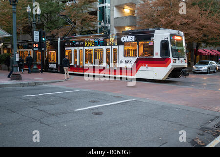 Portland, OR / USA - October 6 2018: Trimet light rail train crossing an intersection in downtown. Stock Photo