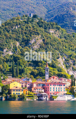 Varenna and Torre di Vezio seen from a boat trip on Lake Como, Lecco province, Lombardy, Italian Lakes, Italy, Europe Stock Photo
