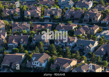 Later afternoon aerial view of modern hillside housing in the Porter Ranch area of Los Angeles, California. Stock Photo