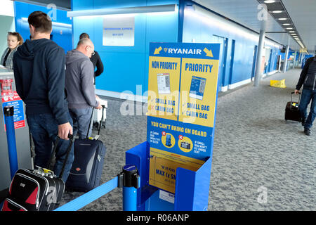 Pic shows: New tiny bag size allowed on Ryanair planes for free.  Checking sizer at all the gates to stop passengers see here at Stansted Airport.   P Stock Photo