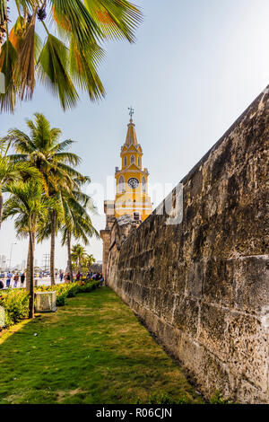 The colourful clock tower (torre del reloj) along the ancient city walls in Cartagena de Indias, Colombia, South America Stock Photo