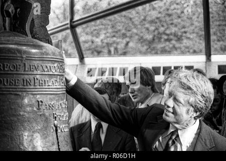 During the Bicentennial, President Jimmy Earl Carter Jr. visits Philadelphia during the presidential campaign to touch the Liberty Bell in Independence Square. Stock Photo