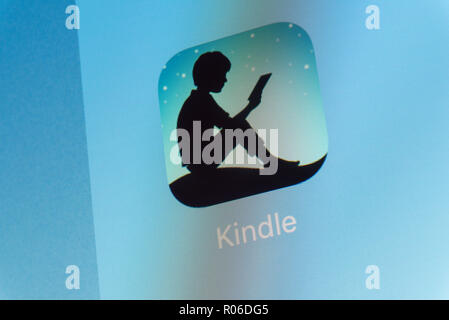 Kindle App on cellphone screen Stock Photo