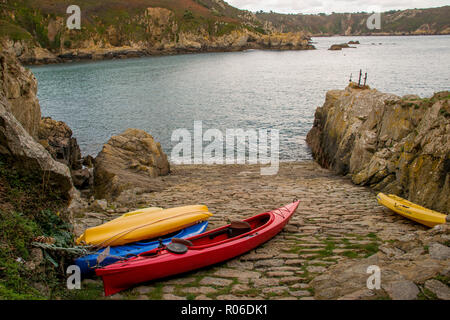 Kayaks tied up on Saints Bay slipway, Guernsey. Stock Photo