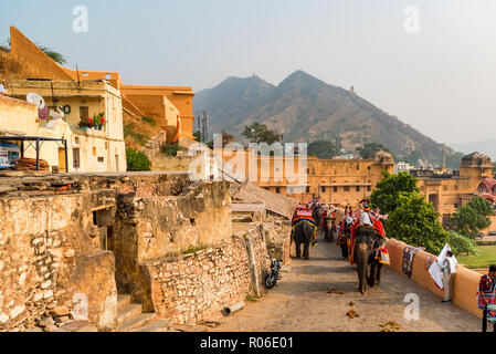 AMBER, INDIA - 5 NOVEMBER 2017: Unidentified people ride elephants to Amber Fort Stock Photo