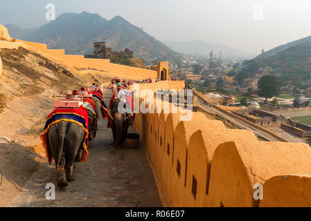 AMBER, INDIA - 5 NOVEMBER 2017: Unidentified people ride elephants to Amber Fort Stock Photo