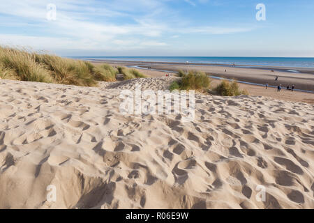 Camber Sands, sandy beach at the village of Camber, East Sussex near Rye, England, the only sand dune system in East Sussex. View of the dunes, grass Stock Photo