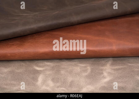 Texture of pieces brown leather. Natural material background Stock Photo