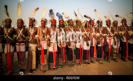 Men dancing Yaake dance and sing at Guerewol festival - 23 september 2017 InGall village, Agadez, Niger Stock Photo