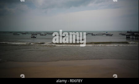 Panoramic view to Accra beach with the fishermans boat in Ghana Stock Photo