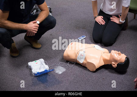 First Aid Training. Defibrillator CPR Practice Stock Photo