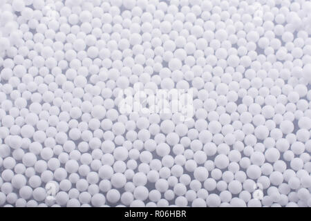 White little polystyrene foam balls as background Stock Photo