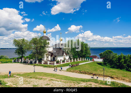 Church of St Constantine and Helena on rural island Sviyazhsk in Russia. Walking Tourists. Stock Photo