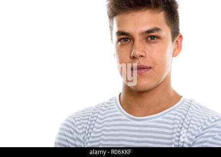 Close up of young handsome man looking at camera Stock Photo