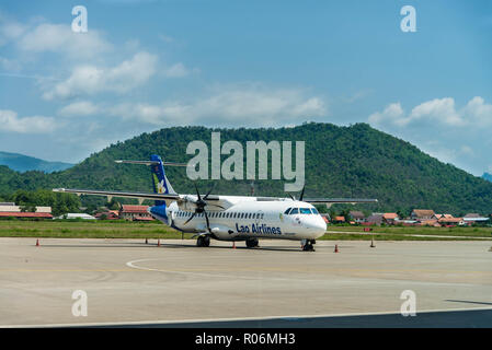 ATR 72 waiting for clearance to take off after passenger boarding at Luang Prabang International Airport, Laos Stock Photo