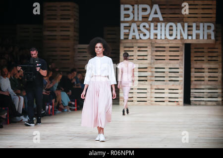 ZAGREB, CROATIA - OCTOBER 25, 2018 : Fashion model wearing clothes for autumn-winter, designed by Stasa Design on the Bipa Fashion.hr fashion show in  Stock Photo