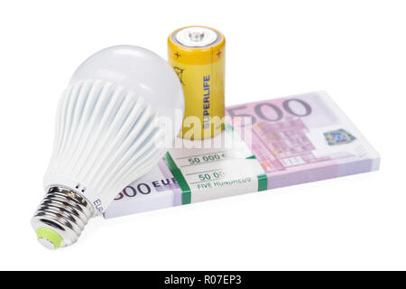 economical led lamp and yellow battery on a pack of euro money isolated on white background Stock Photo