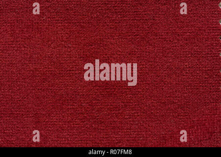 Contrast soft fabric texture in fascinating red colour. Stock Photo
