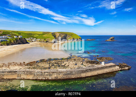 27 June 2018: Portreath, Cornwall, UK - The beach and breakwater at Portreath, North Cornwall, UK, during the summer heatwave. Stock Photo
