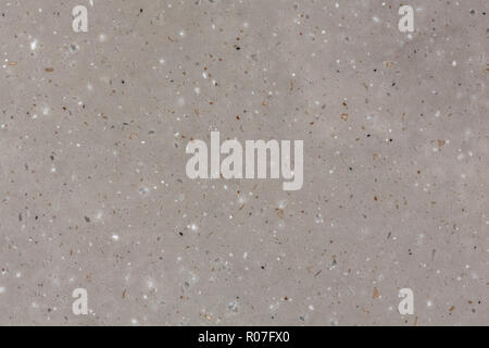 Artificial stone quartz agglomerate cream gloss texture. Stock Photo