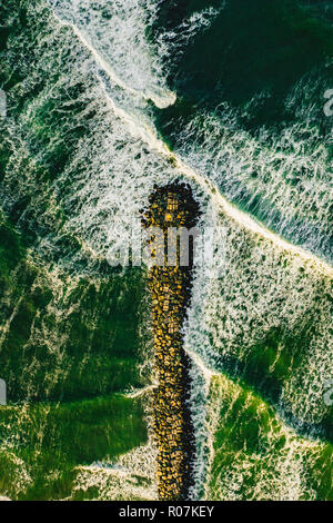 Splashing waves seen from above Stock Photo