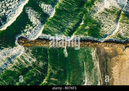 Splashing waves seen from above Stock Photo