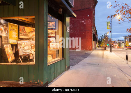 An Art shop in downtown along John Street North in the Town of Arnprior in Renfrew County at dusk. Arnprior, Ontario, Canada. Stock Photo