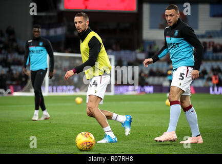 Aston Villa's Conor Hourihane (left) and James Chester warm up prior to the Sky Bet Championship match at Villa Park, Birmingham. Stock Photo