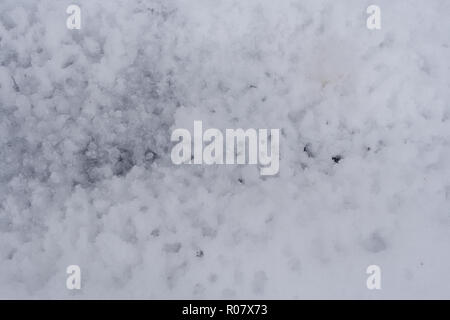 Abstract background of melting snow structure. Top view. Stock Photo