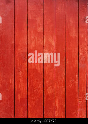 Vertical parallel wooden planks, painted in red Stock Photo