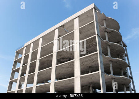 A multi-storey building construction on the background of blue sky Stock Photo