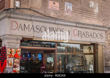Toledo, Spain - April 28, 2018: Showcase of a souvenir shop in the historic center of the city on a spring day Stock Photo