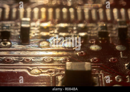 Texture or background created with electronic elements coming from an electronic board with printed circuit boards. Stock Photo