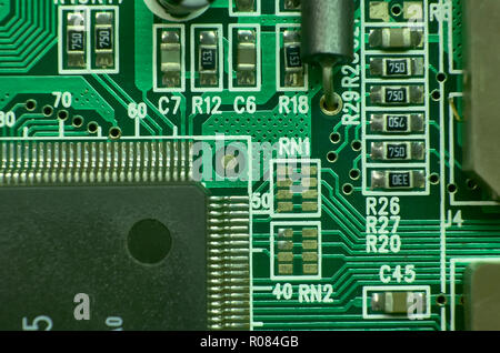 contacts and electronic circuits printed with various components and microprocessors: excellent texture for graphic projects. Stock Photo