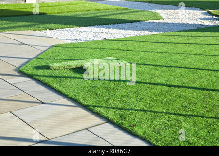 Artificial lawn garden. Artificial grass, artificial lawn UK. Stock Photo