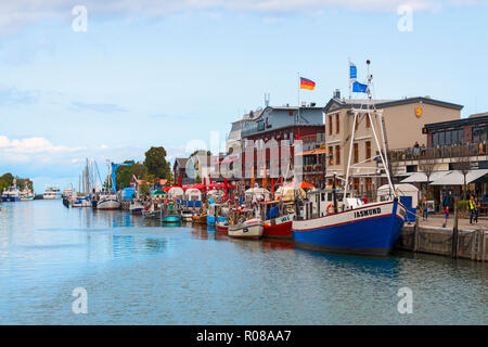 Warnemunde Germany on Alte Strom old channel a popular cruise ship stop on the Baltic Sea Stock Photo
